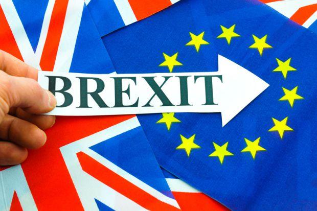 hand-holding-brexit-sign-eu-referendum.jpg